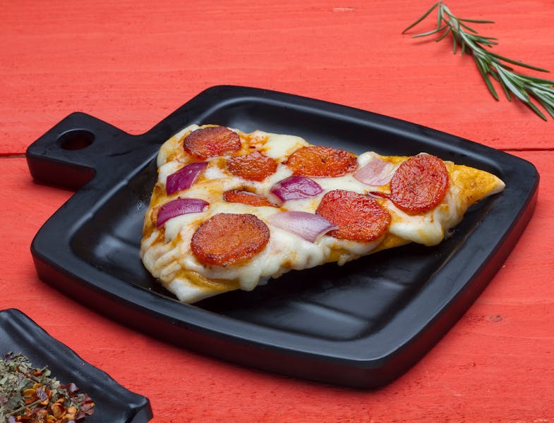 Pequods sausage and pepperoni deep dish pizza